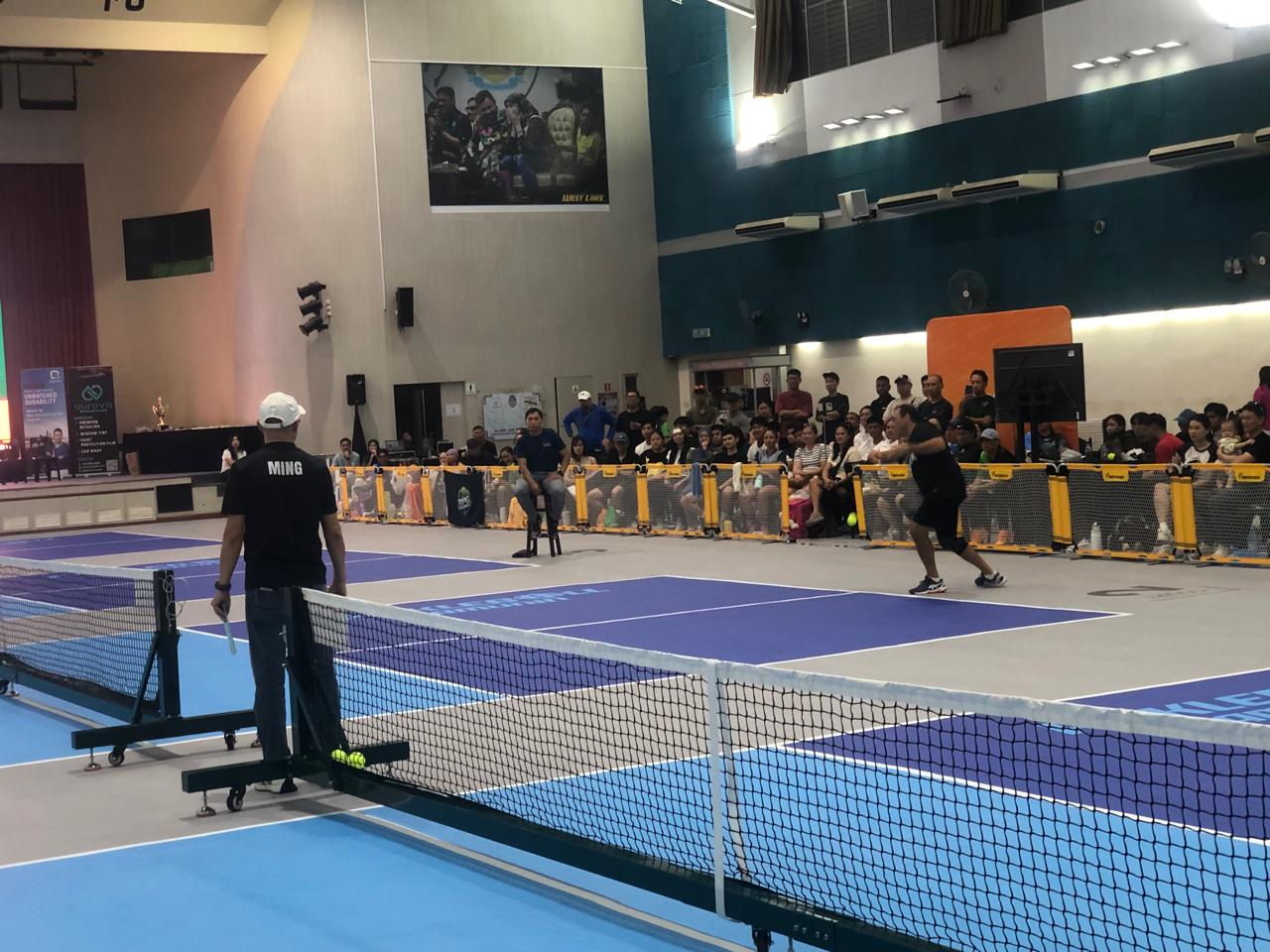 Players on court during tournament