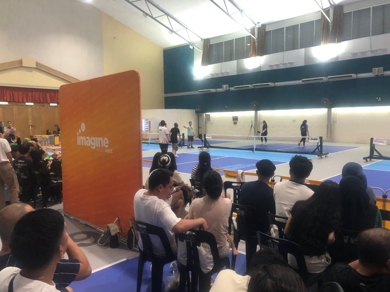 Audience watching live pickleball at Lamunin